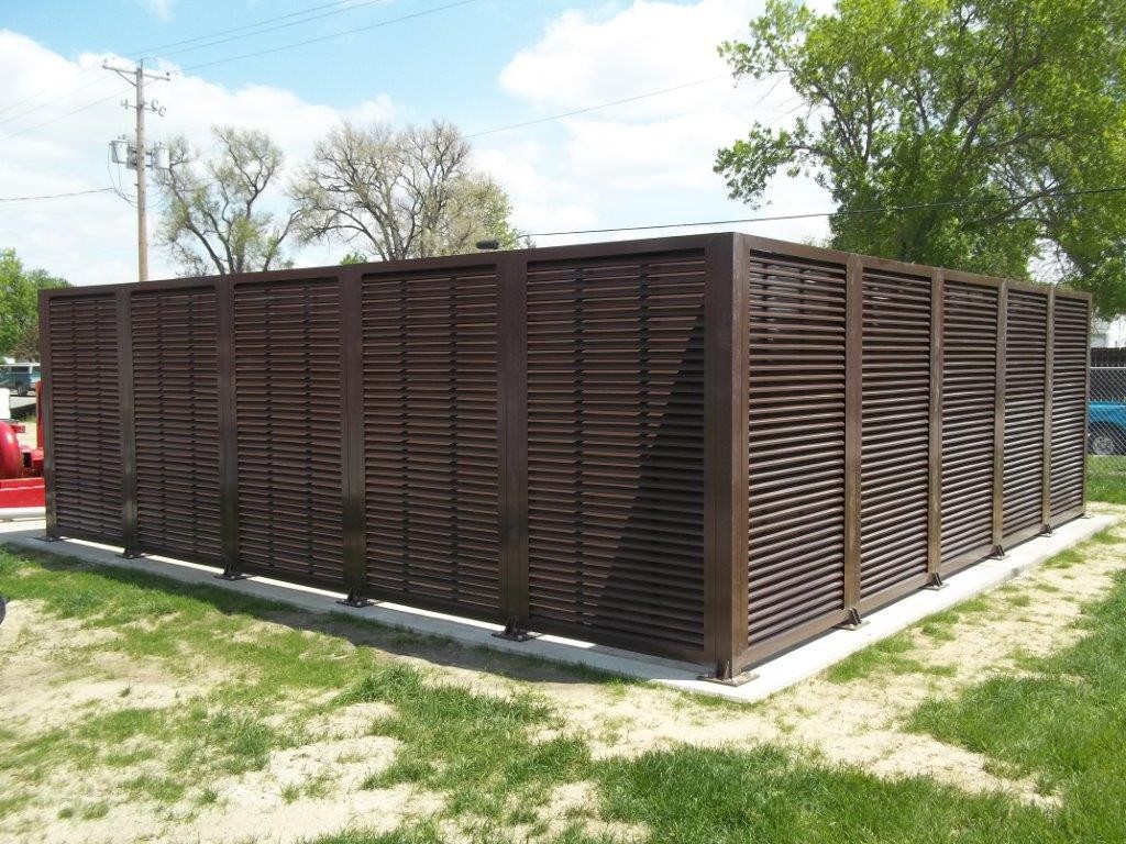 PalmSHIELD Louvers. Steel vertical louver screen system.  architectural mechanical screening screen louvered semi private private solid staggered board on board shadow box alternating ametco barnett and bates industrial louvers rooftop louvers beta orsogrill omega chillers generators truck wells outside storage condensors rooftop equipment patios trash dumpsters transformers HVAC courtyards pool equipment fence aluminum galvanized steel degree of openness direct visibility standalone wall louvers 