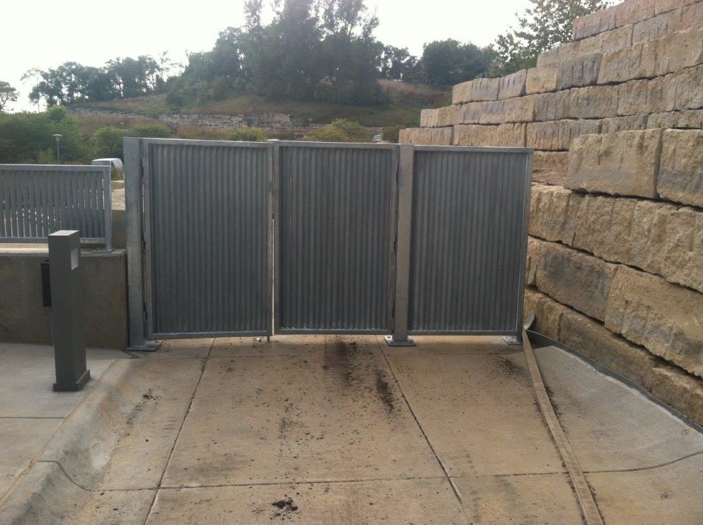 Three vertical louver panels installed at an outdoor entrance