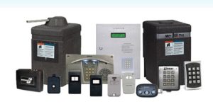 A photo of transmitters, keypads, operators, receivers, and barrier arms