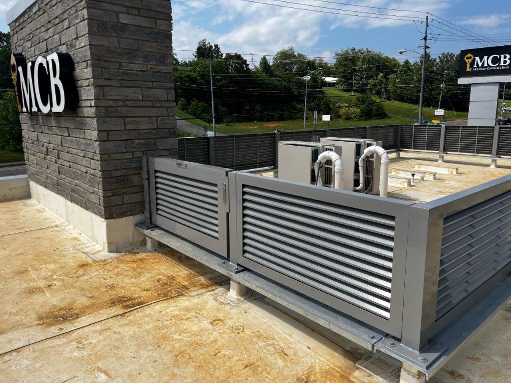 Daytime photograph of rooftop equipment screening installed on a bank rooftop in Johnson City, Tennessee.