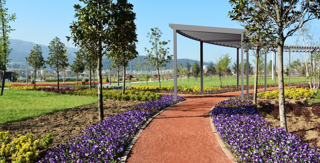 A commercial sun shade structure in a public garden.