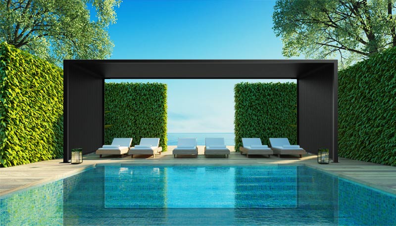 A poolside sun shade positioned over six sun chairs.